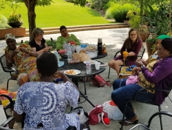 The Utah Health & Human Rights knitting group gathers at Tracy Aviary during the summer of 2018. 